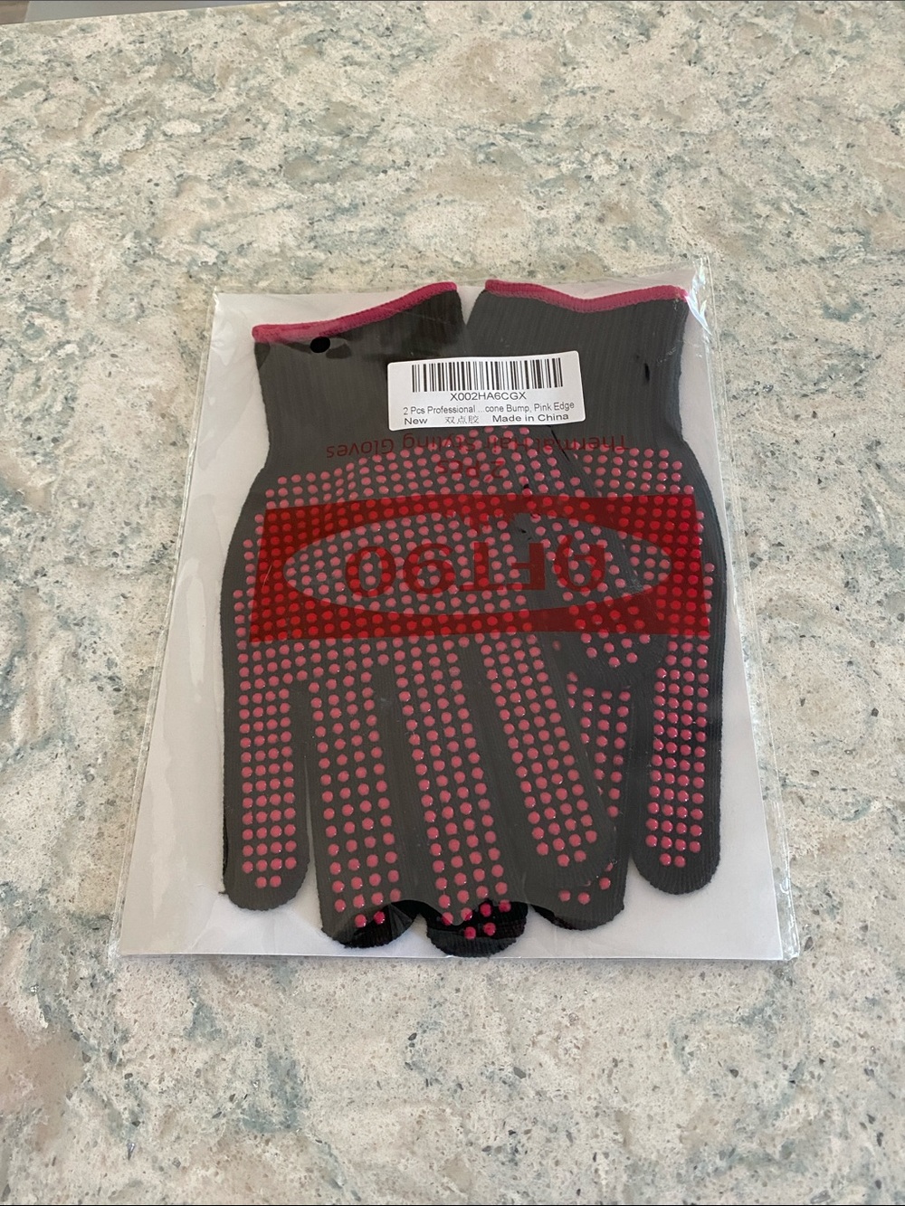 Black and Pink Bump Grip Gloves for curling hair and hot accessories